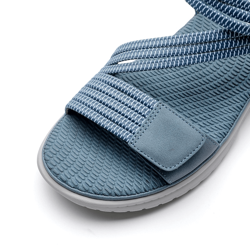 Close-up of blue Sport Women's Soft Sandal with Velcro strap and textured PU leather, perfect for comfort and style in any activity.